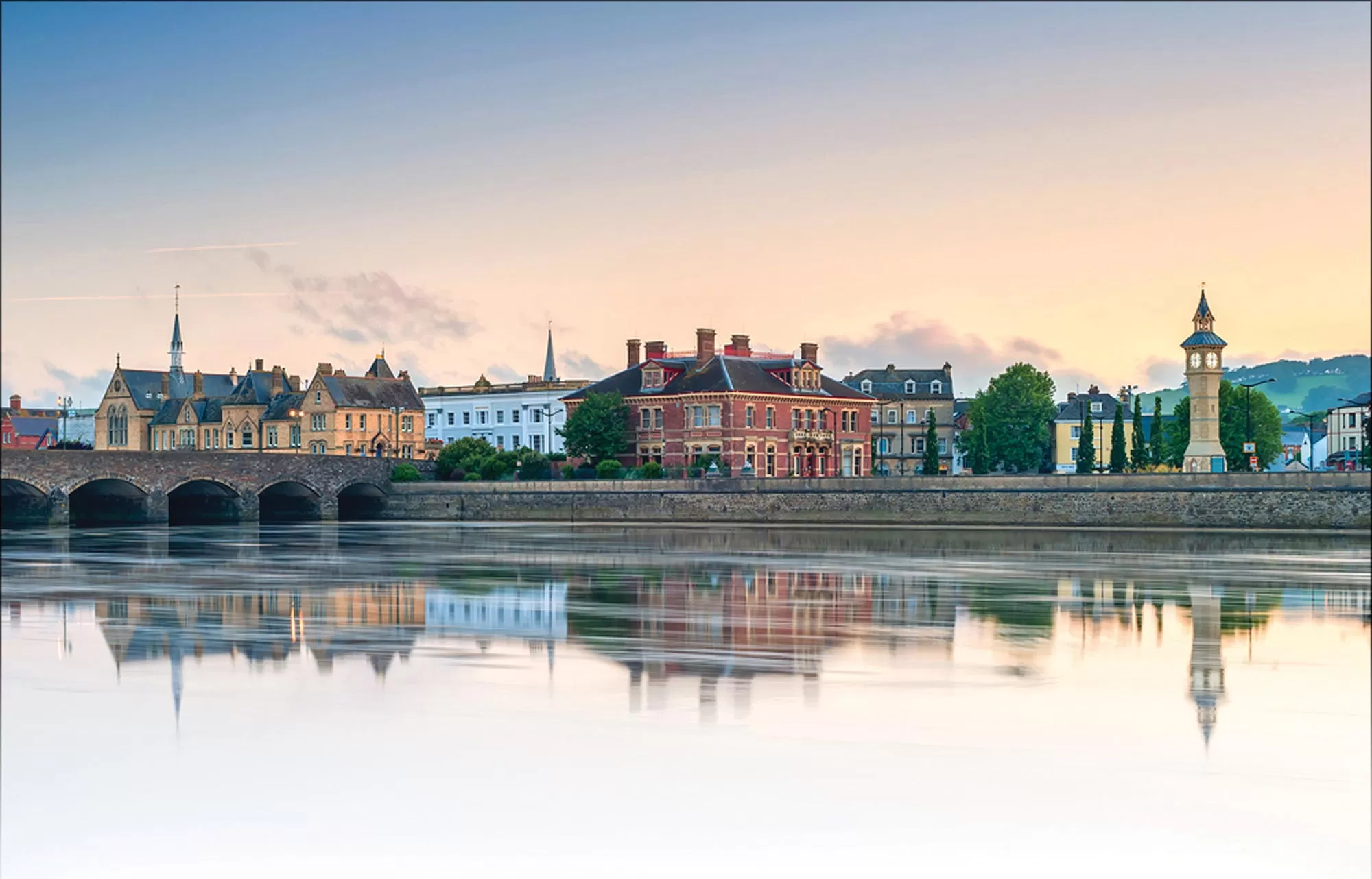 Barnstaple riverside with historic buildings reflected in water